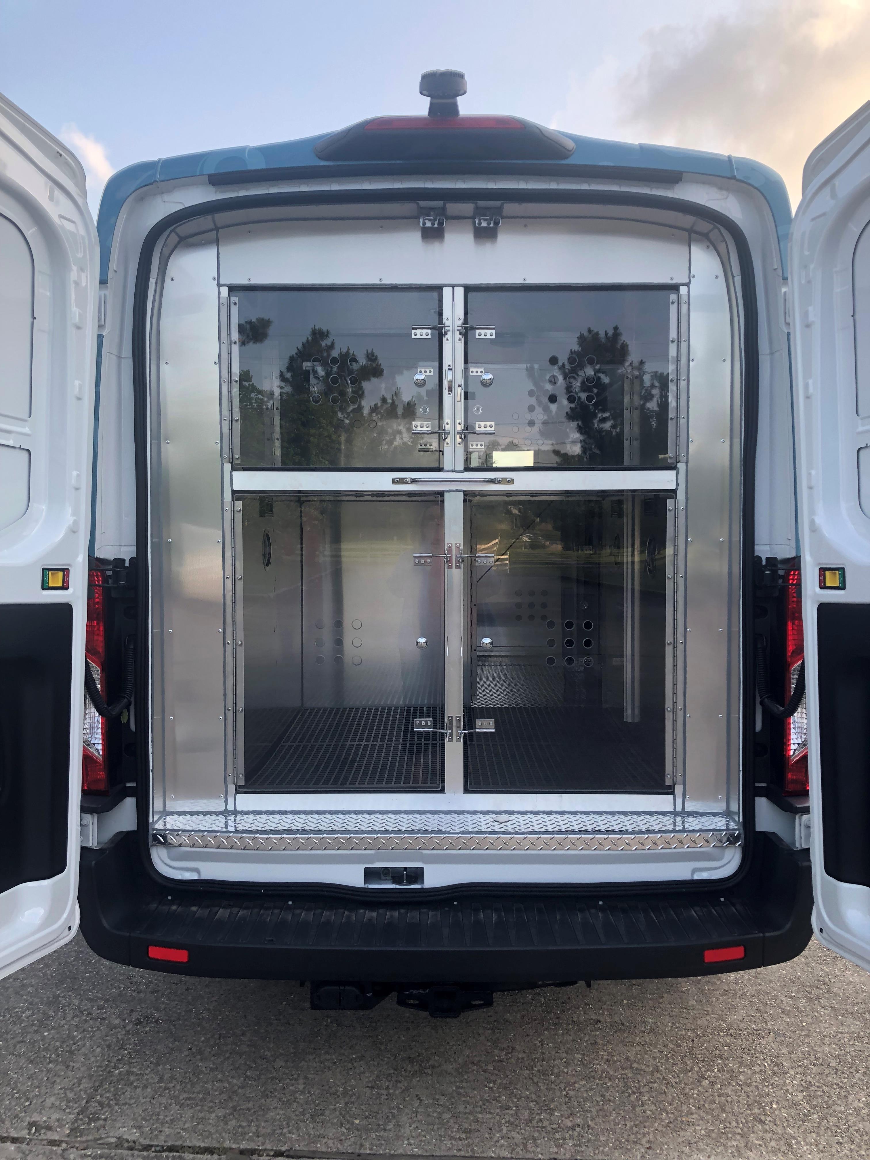 interior of of Camp Bow Wow shuttle van